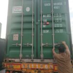 Container being loaded with gym equipment, showcasing efficient packing and secure shipment for international delivery