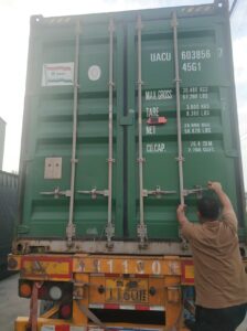 Container being loaded with gym equipment, showcasing efficient packing and secure shipment for international delivery